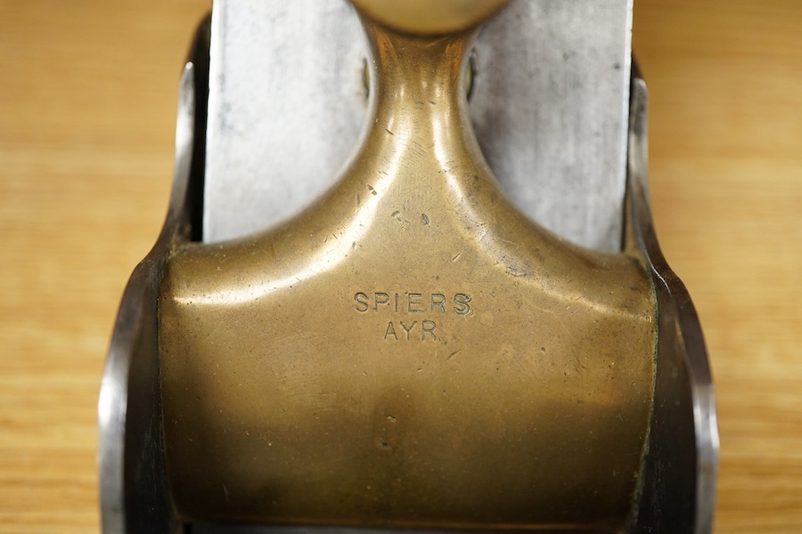 A Stewart Spiers steel 15 1/2” panel plane, stamped with Spiers, Ayr to the brass lever cap, chip breaker and iron, with rosewood infill